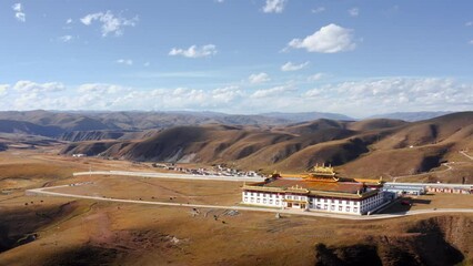 Royal red white and gold building in Tibetan Sichuan Tagong grasslands of Western China
