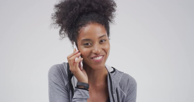 Face, woman and smile in studio for phone call, contact and laugh for joke on white background. African girl, smartphone and funny communication for social networking, gossip and mobile conversation