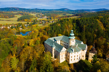 View from drone of impressive medieval Lemberk castle in center of Lusatian Mountains on sunny...