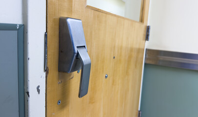 door handle, reflecting light, inviting entry to new opportunities and possibilities