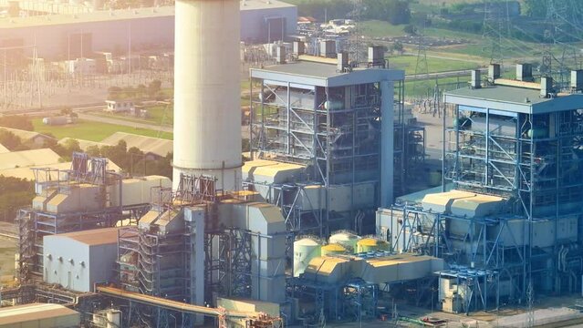 A Thermal Power Plant employs combustion processes to heat water, creating high-pressure steam. This steam drives turbines connected to generators, converting thermal energy into electrical power.

