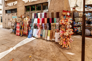Shop with souvenirs for tourists in the reconstructed old part of the Dubai city - Al-Bastakiya quarter in the Dubai city, United Arab Emirates