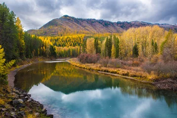 Gordijnen Peaceful Autumn Reflections In Glacier National Park © RacheleB