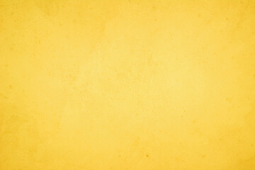 Yellow concrete stone texture for background in summer wallpaper. Cement and sand wall of tone vintage minimal. Concrete abstract wall of light yellow color, cement texture white blank for home decor.