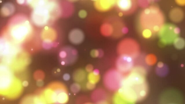 Colorful gold pink yellow bokeh festive animation background. Looping glowing blurry boke backdrops