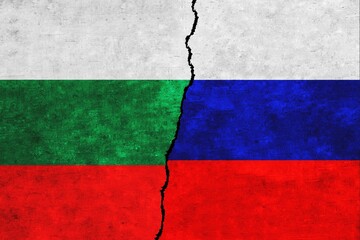 Bulgaria and Russia painted flags on a wall with a crack. Bulgaria and Russia relations. Russia and Bulgaria flags together