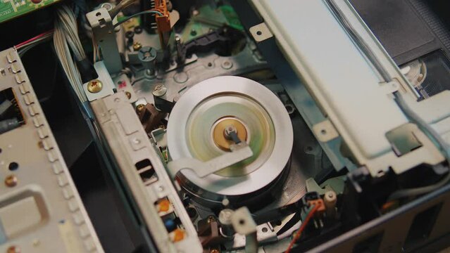 video cassette is loaded in the VCR, Magnetic videotape in the VCR mechanism. 
