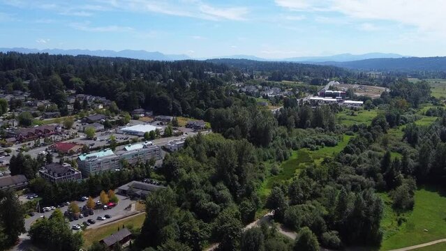 Aerial view of Duvall, WA in the Snoqualmie Valley with the Cascade Mountains in the background