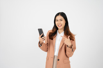 Fototapeta premium Beautiful Asian businesswoman holding and using smartphone on white isolated background.