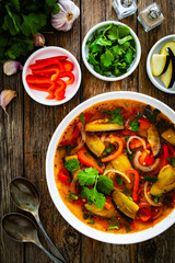 Vegetable soup on wooden table
