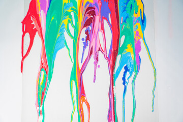 Sweet tones flowing and blending together on the white floor. .It is a strange abstract picture..fantasy image of dripping paint on white background..colorful of pantone color background.