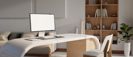 A computer mockup on a modern desk in a modern and luxurious living room or CEO's office.