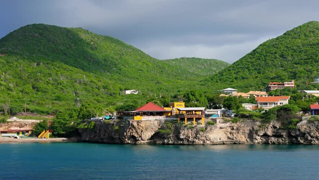 Vibrant colorful homes above Playa forti Westpunt Curacao, aerial