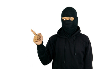 A man wearing a mask and pointing to copy space besides her, isolated on white background