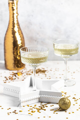 Champagne in glasses close-up, sparkles, glitter, Christmas, New Year, holiday