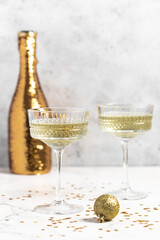 Champagne in glasses close-up, sparkles, glitter, Christmas, New Year, holiday