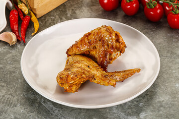 Tasty roasted chicken wing with spices