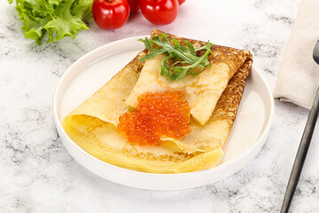Russian pancake with red caviar