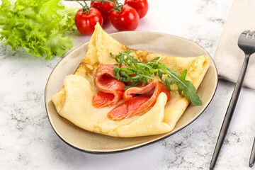 Russian pancake with salmon fish