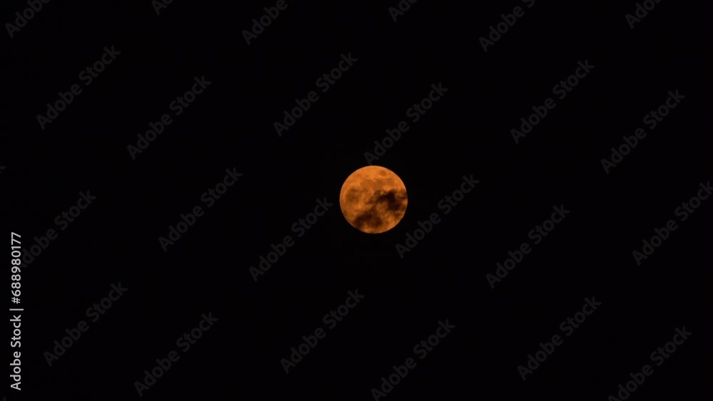 Canvas Prints the full moon plays between the moon and the clouds