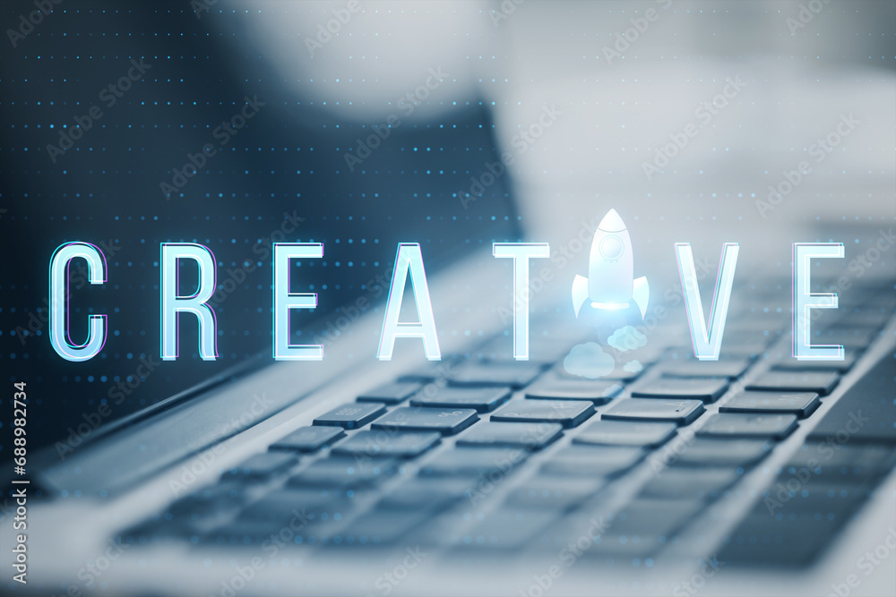 Poster Close up of laptop computer with creative text and spaceship replacing letter on blurry background with bokeh circles. Think, idea, start up, creative and inspire concept. Toned image.