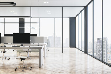 Contemporary glass coworking office interior with wooden flooring, panoramic windows and city view,...