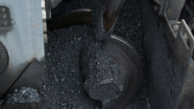Process of asphalting road construction infrastructure by spreading, compressing, compacting, leveling and smoothing the asphalt road surface using a hopper asphalt paver finisher