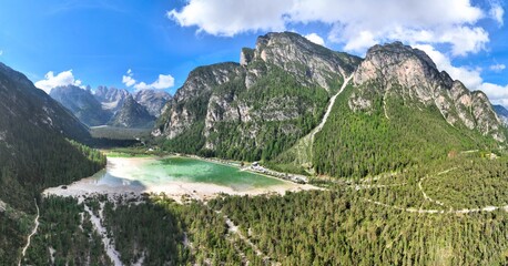 Landro lake - Aerial overview of the landscape of the Sesto Dolomites from above
