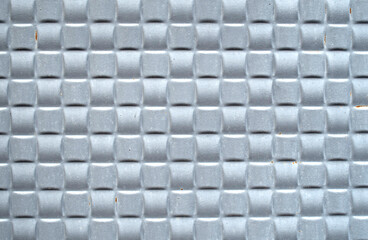 Gray decorative metal surface close up