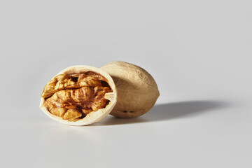 walnuts in shell on grey background