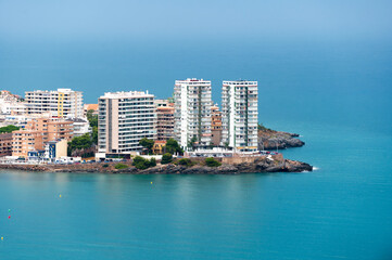 Close-up view of tourist apartments by the sea in Playa de la Concha in Oropesa del Mar, Spain