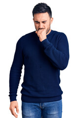 Young handsome man wearing casual clothes feeling unwell and coughing as symptom for cold or bronchitis. health care concept.