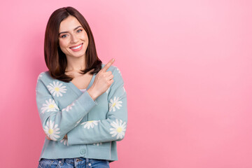 Photo of confident cute lady direct finger shopping poster advertise wear print cardigan isolated pink color background