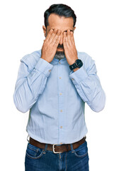 Middle aged man with beard wearing business shirt rubbing eyes for fatigue and headache, sleepy and tired expression. vision problem