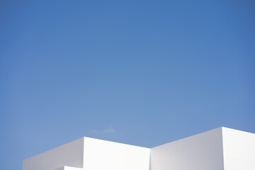 architecture and landscape concept with white building with clear sky background