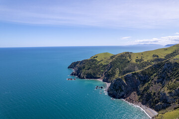 aeriel view of mountain and ocean in new zealand