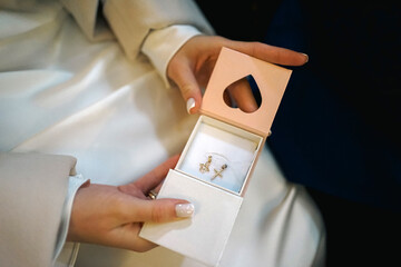 Gifts for the newborn icon and a religious cross with a crucifix.