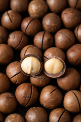 Close up of peeled macadamia nuts background.