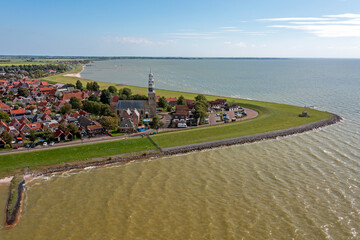 Aerial from the historical city Hindeloopen at the IJsselmeer in the Netherlands