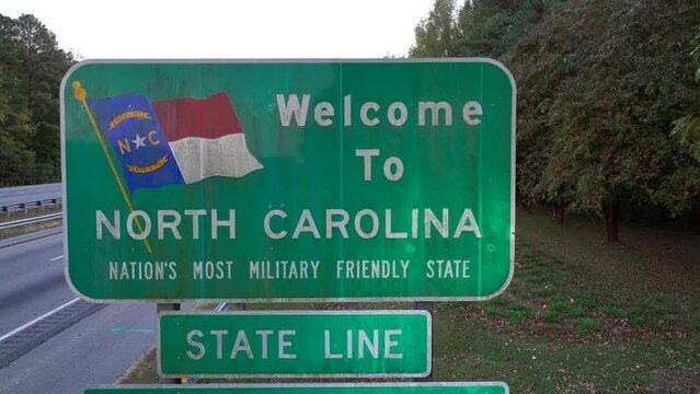 Welcome to North Carolina: Nation's Most Military Friendly State. Aerial shot along interstate highway.