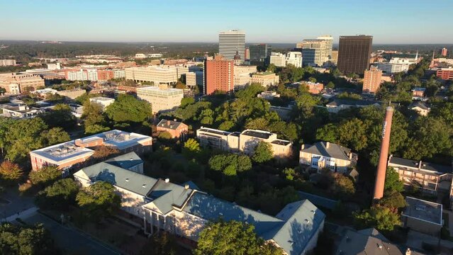 Columbia SC skyline as seen from University of South Carolina campus during golden hour. Aerial.