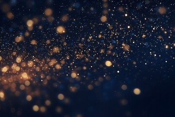 Abstract blurry golden sparkling light dots against a dark blue background, Christmas and New Years celebration 