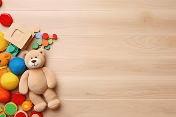 Top view of kids toys frame on wooden background with copy space. - Powered by Adobe