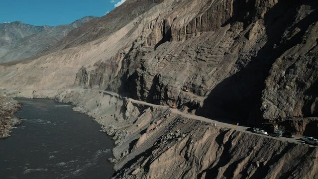 Heavy machinery clearing Landslide near Tatta Pani on Karakoram Highway, Pakistan. Tatta Pani is a hot water spring on the highway towards Mainland China. This section is prone to landslides.