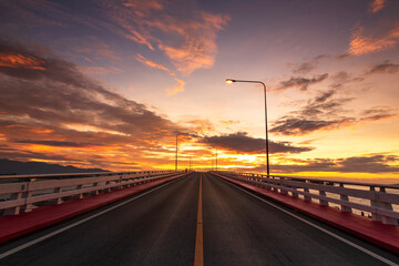 View beautiful of Bridge crossing the sea with dramatic sunrise sky. It is a approximately 1 km...