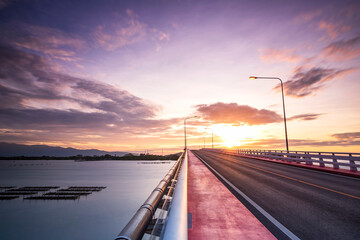 View beautiful of Bridge crossing the sea with dramatic sunrise sky. It is a approximately 1 km...