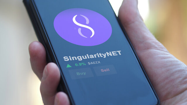 November 17th 2023. An investor analyzing the price of SingularityNET, the token coin $AGIX on a crypto exchange sreen.