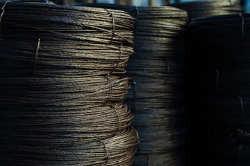Pile of iron, metal or steel wire rod or coil background for Construction industry. steel wire...