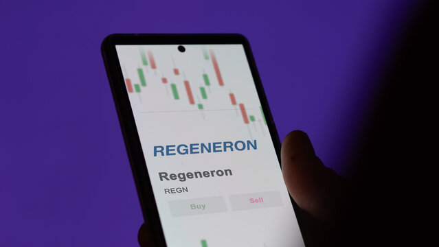 November 27st 2023 Tarrytown, New York. The logo of Regeneron on the screen of an exchange. Regeneron price stocks, $REGN on a device.
