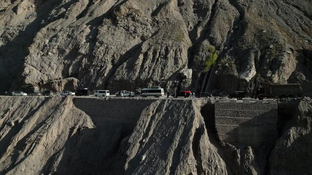 Heavy machinery clearing Landslide near Tatta Pani on Karakoram Highway, Pakistan. Tatta Pani is a hot water spring on the highway towards Mainland China. This section is prone to landslides.